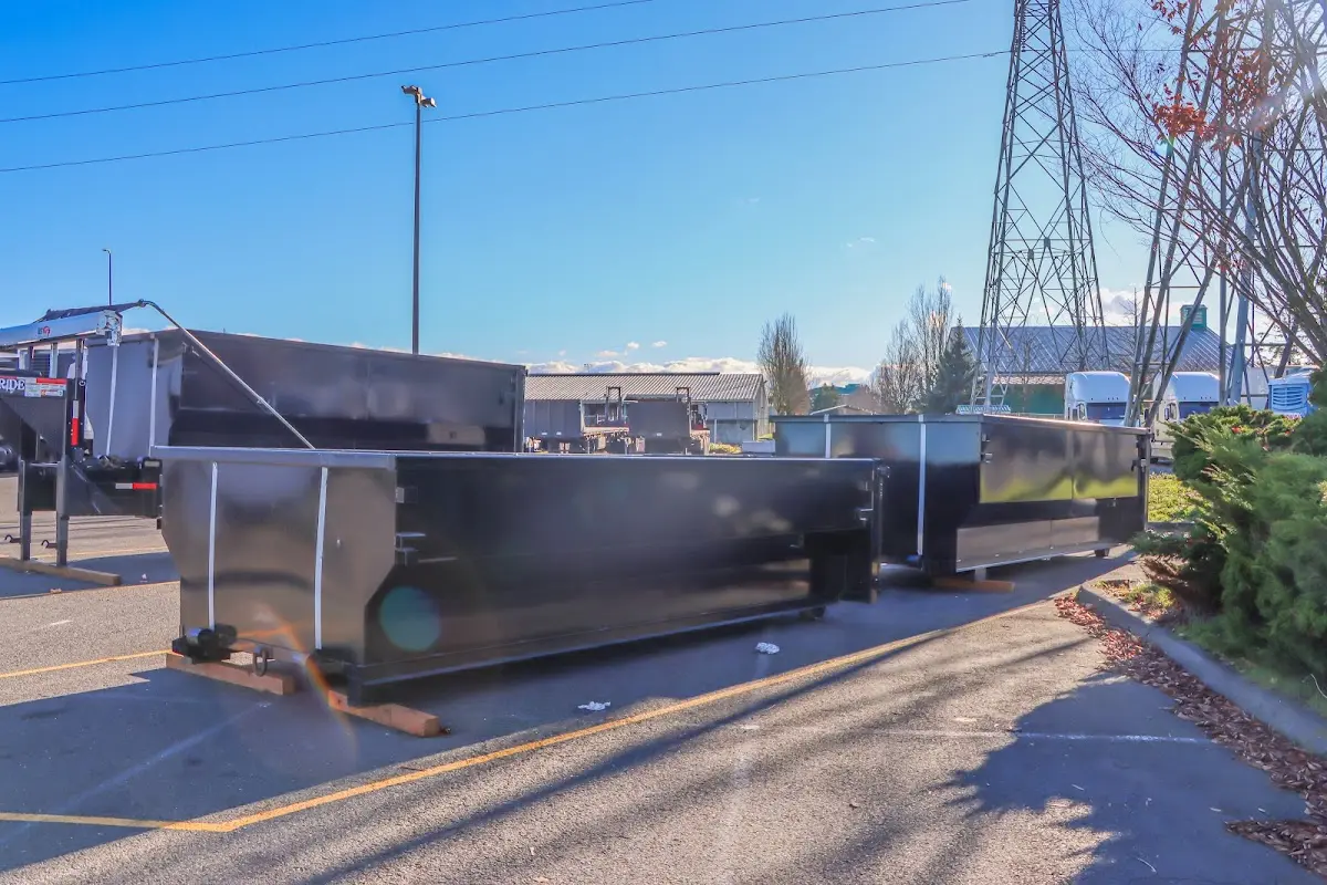 Roll-off dumpster ready for waste disposal at job site for Yard Waste Dumpster Rental in Bell